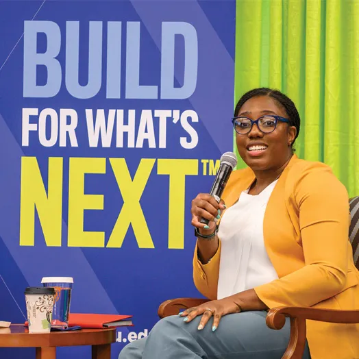 student talking with microphone