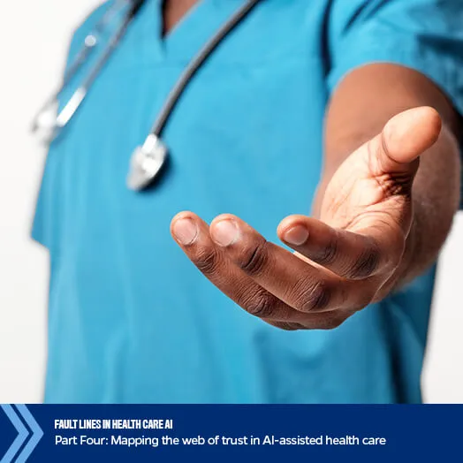 physician with hand outstretched