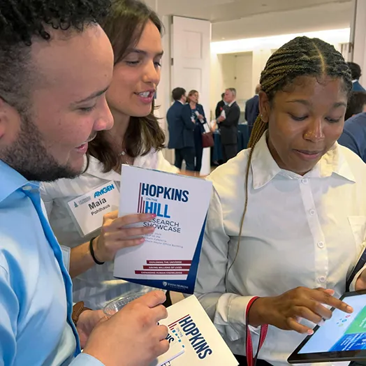 CHDAI students networking Hopkins on the hill